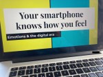 Computer showing presentation "Your smartphone knows how you feel"